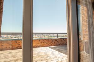 Rõdu või terrass majutusasutuses Hotel Monaco Zeebrugge Beach by Rikas Hotels