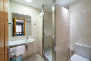 Kúpeľňa v ubytovaní Apartamentos Caracas