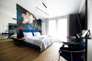 Telewizja i/lub zestaw kina domowego w obiekcie Aparthotel Inspire Miodova Residence