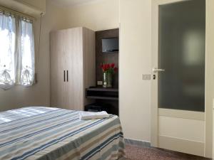 Postel nebo postele na pokoji v ubytování Hotel Verdesolemare