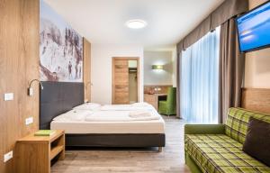 Cama o camas de una habitación en Parc Hotel Miramonti