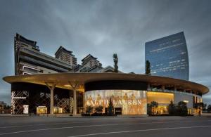 a building with a sign that reads auditorium at Megafun Residance B1 in Baku