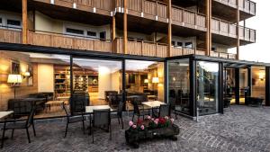 Un restaurante o sitio para comer en Parc Hotel Miramonti