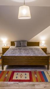 Кровать или кровати в номере Vadkert Vendégház