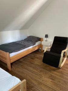 Postel nebo postele na pokoji v ubytování Jahn Apartments