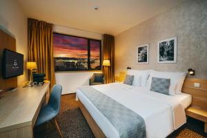 Iris Hotel Eden - Czech Leading Hotels客房内的一张或多张床位