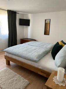 Postel nebo postele na pokoji v ubytování Ferienhaus Kaliva