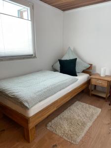 Postel nebo postele na pokoji v ubytování Ferienhaus Kaliva