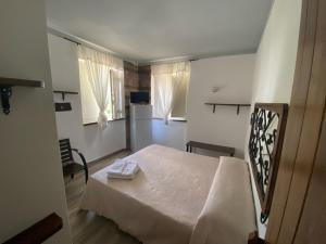 Postel nebo postele na pokoji v ubytování La Casa di Michele