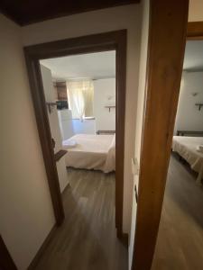 Postel nebo postele na pokoji v ubytování La Casa di Michele
