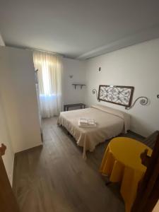 Postel nebo postele na pokoji v ubytování La Casa di Michele