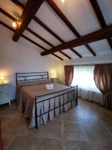 Krevet ili kreveti u jedinici u objektu Agriturismo Sotto la Rocca