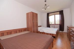 Posteľ alebo postele v izbe v ubytovaní Apartmany Sileas