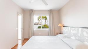 Кровать или кровати в номере Real Agua Amarga Las Villas