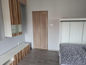 Posteľ alebo postele v izbe v ubytovaní Yakuzza Apartments