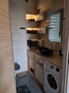 Kuchyňa alebo kuchynka v ubytovaní Yakuzza Apartments