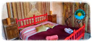 Postel nebo postele na pokoji v ubytování Bed and Breakfast Balli coi Lupi