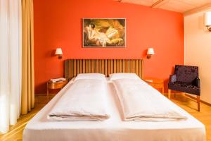 Postel nebo postele na pokoji v ubytování Hotel Traube