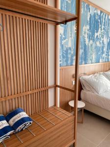 a bedroom with a bunk bed and a bed at B&B Giro Di Boa in Lampedusa