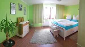 Postel nebo postele na pokoji v ubytování Hering FeWo I Apartment Terrace