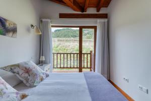 Postel nebo postele na pokoji v ubytování Apartamentos Bores