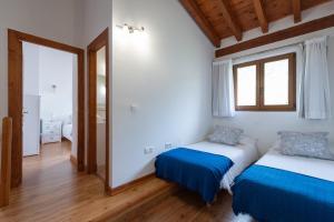 Postel nebo postele na pokoji v ubytování Apartamentos Bores