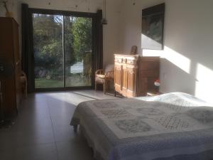 Ένα ή περισσότερα κρεβάτια σε δωμάτιο στο Le Grès 313 +41 φωτογραφίες