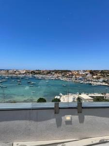 a view of a harbor with boats in the water at B&B Giro Di Boa in Lampedusa