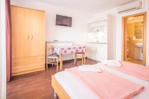 Voodi või voodid majutusasutuse Apartments Bogdanic Krk I toas
