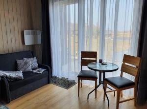 Φωτογραφία από το άλμπουμ του Stonkų sodyba Grapeldvaris σε Varkaliai