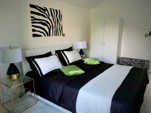 Łóżko lub łóżka w pokoju w obiekcie Vacation Home Vidučić