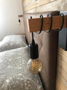 Postel nebo postele na pokoji v ubytování Appartement zur schlafenden Jungfrau