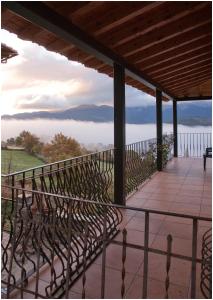 a balcony with a view of the water at Ca l ' Isidró in Músser