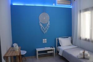 Poseidon Rooms客房内的一张或多张床位