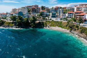 an aerial view of a beach in a city at Anemos Seaside Apartment in Neos Marmaras