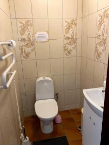 Vonios kambarys apgyvendinimo įstaigoje Liškiavio apartamentai