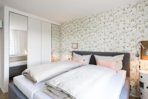 Säng eller sängar i ett rum på Nordlys - Local & Style