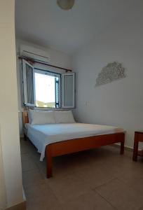 Postel nebo postele na pokoji v ubytování C-view apartments