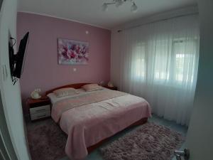 Voodi või voodid majutusasutuse Apartmani Cobanov Josipa toas