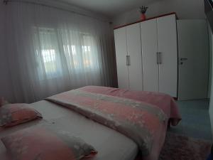 Voodi või voodid majutusasutuse Apartmani Cobanov Josipa toas