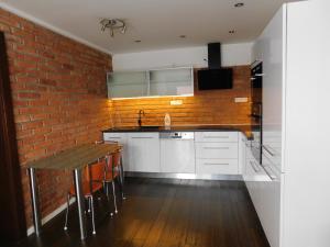 Kuchyň nebo kuchyňský kout v ubytování Apartmánový Penzión Bojnice