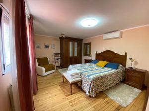 Postel nebo postele na pokoji v ubytování Alvares de Corvera