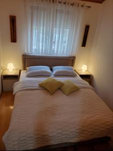 Katil atau katil-katil dalam bilik di Apartment Maja