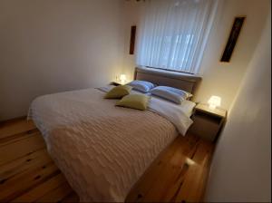Katil atau katil-katil dalam bilik di Apartment Maja