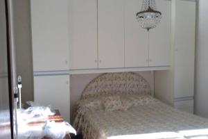Postel nebo postele na pokoji v ubytování Splendida casa con ampio terrazzo vista mare