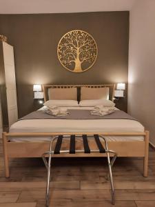 A bed or beds in a room at GELSO HOME