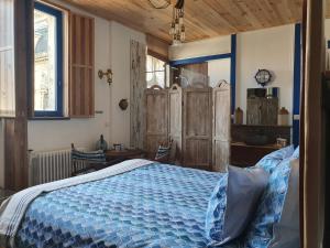 Кровать или кровати в номере B & B Les Secrets des Loges