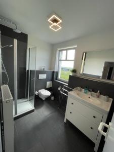 O baie la Studio-Apartment Ankerplatz im Ferien-Resort Rügen