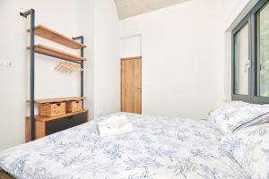 Postel nebo postele na pokoji v ubytování Unique Design Vila Doris