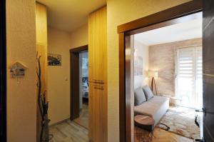 Postel nebo postele na pokoji v ubytování Apartman Lora
